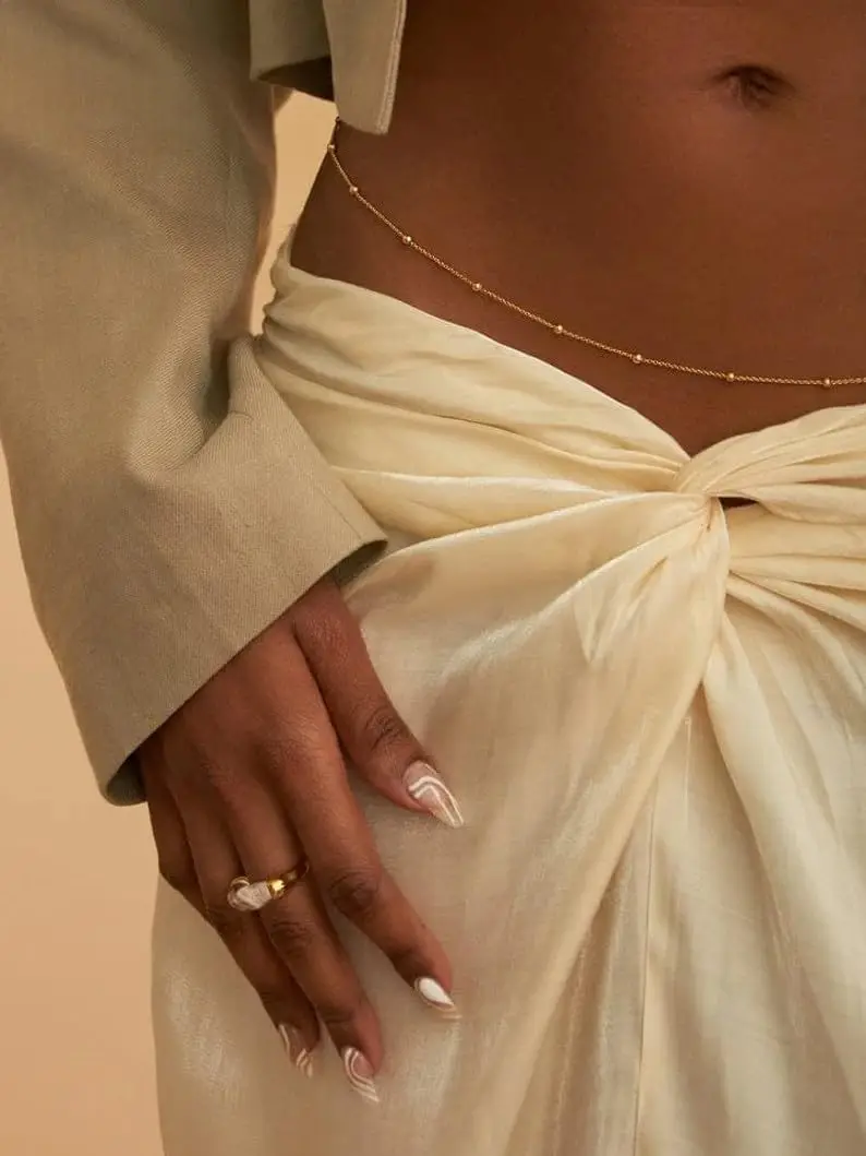 Joias corporais de biquíni aju - Body Jewelry Gold avaliação e preço